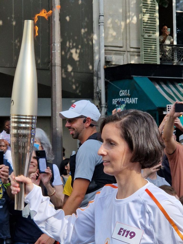 les porteurs de la flamme olympique